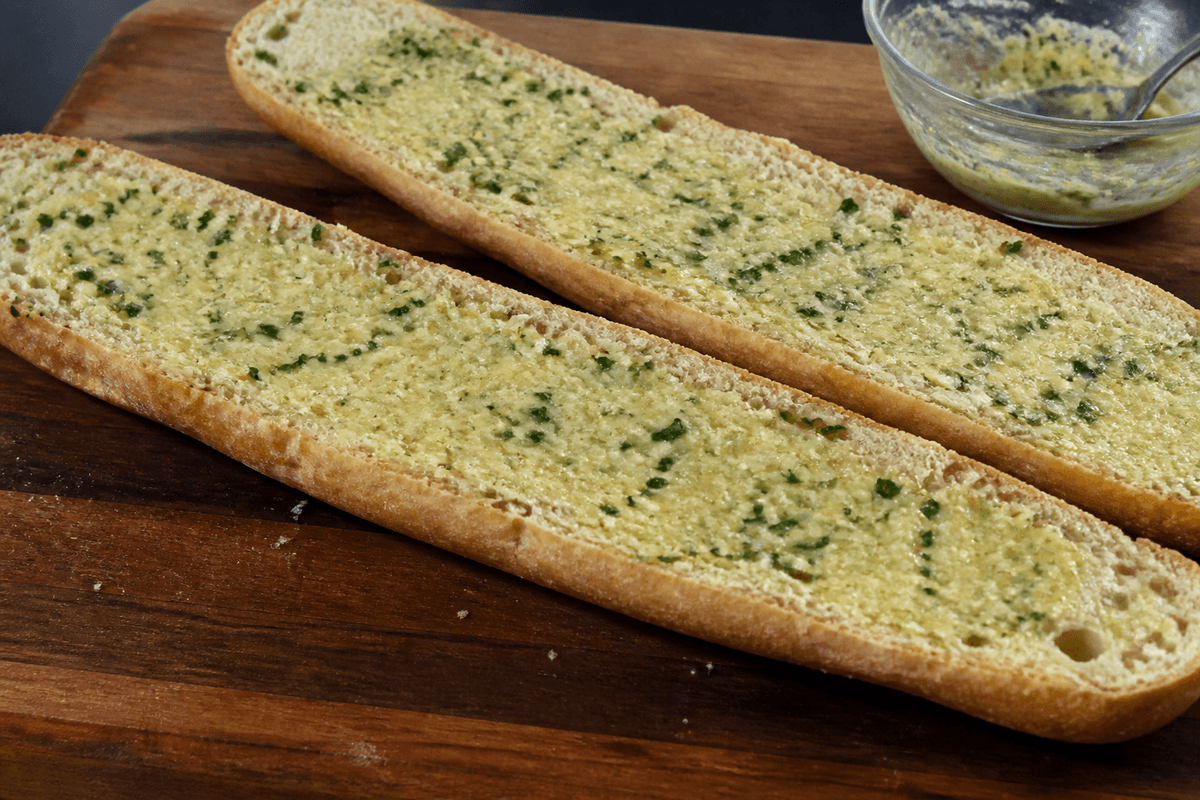 Garlic butter spread on baguette