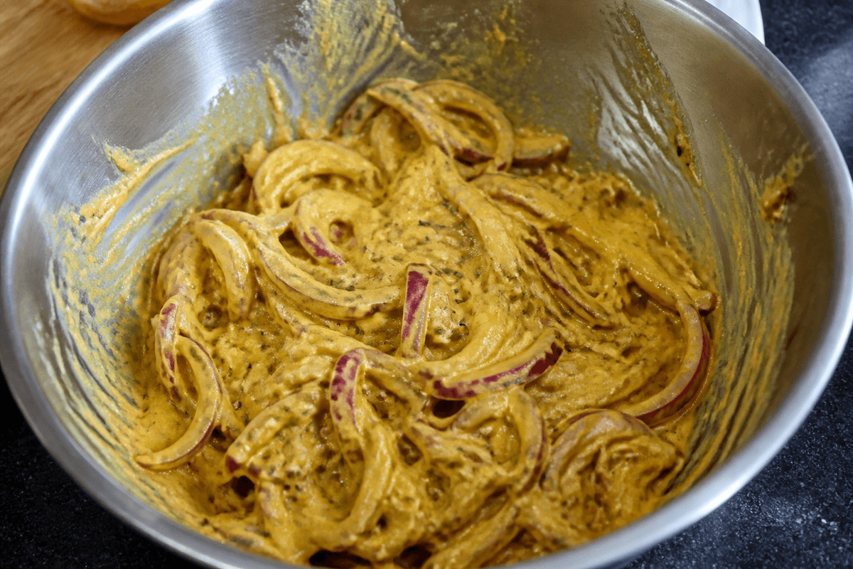 Onion bhaji batter in a bowl